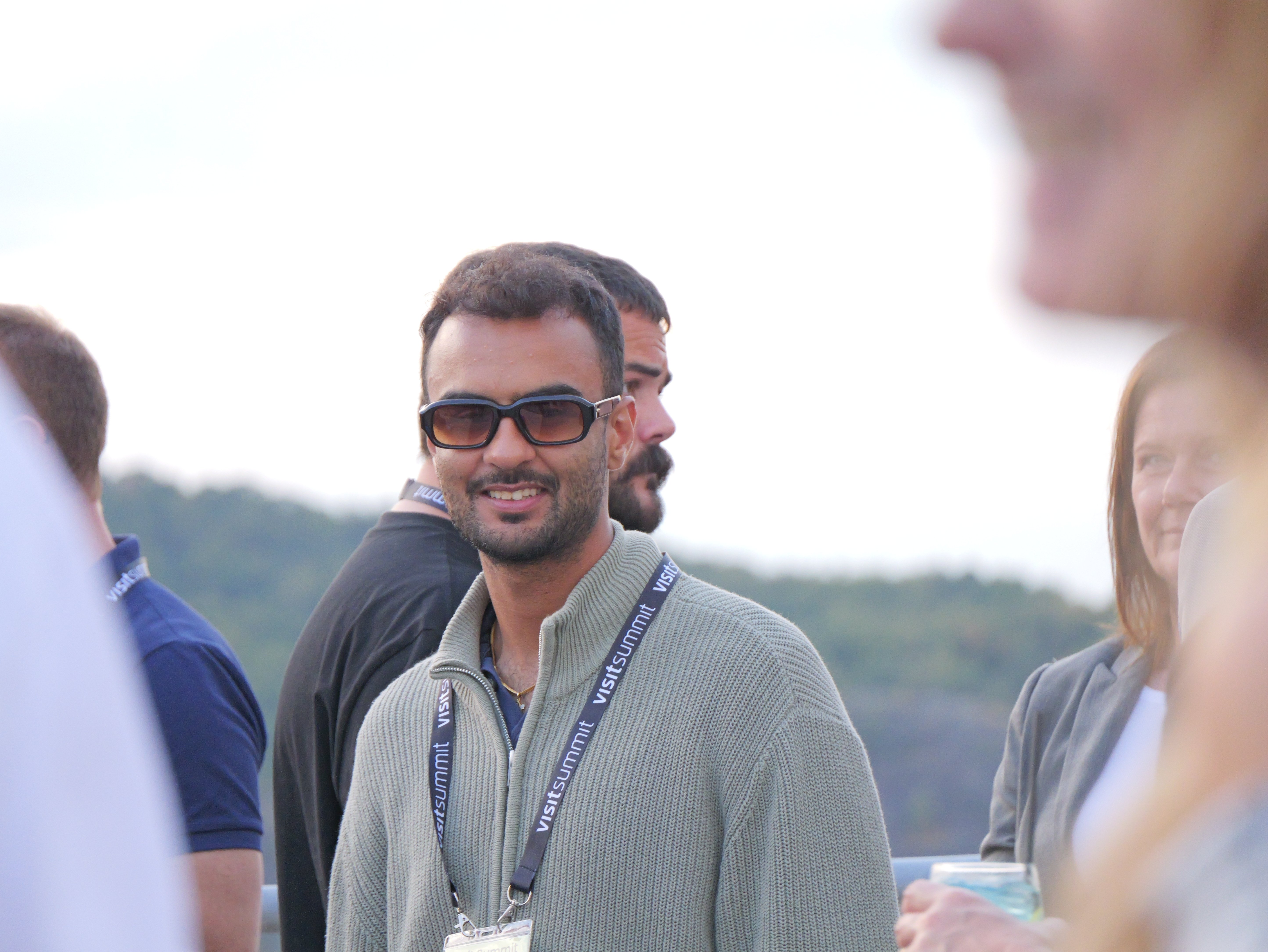 People mingling during pre-summit